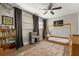 bedroom featuring creative decor and a ceiling fan, with ample space for play at 736 Forest Glen Ct, Maitland, FL 32751