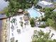 Resort-style pool offers cabanas, a white sand beach, and lush tropical landscaping at 1106 Gran Bahama Blvd # 1106, Davenport, FL 33897