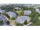 An aerial view shows the condo's proximity to the lake and surrounding greenery at 1106 Gran Bahama Blvd # 1106, Davenport, FL 33897