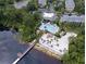 Community features a resort-style pool, sandy beach, and dock extending to a lake at 1106 Gran Bahama Blvd # 1106, Davenport, FL 33897