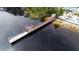 Aerial view of the wooden dock on the lake at 1106 Gran Bahama Blvd # 1106, Davenport, FL 33897
