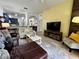 Open-concept living area showcasing seamless flow to the dining room and modern kitchen at 1106 Gran Bahama Blvd # 1106, Davenport, FL 33897