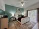 Well-lit main bedroom with a sliding door access to a private outdoor balcony at 1106 Gran Bahama Blvd # 1106, Davenport, FL 33897