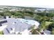 An aerial image displays the community pool, the clubhouse, and views of the adjacent lake at 1106 Gran Bahama Blvd # 1106, Davenport, FL 33897