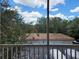 A view of covered parking as seen from the unit's screened in balcony at 1325 Lake Shadow Cir # 12205, Maitland, FL 32751