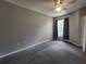 Bedroom with neutral paint and carpet, ceiling fan, and natural light at 1325 Lake Shadow Cir # 12205, Maitland, FL 32751