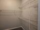 This walk-in closet features wire shelving for optimal storage solutions at 1325 Lake Shadow Cir # 12205, Maitland, FL 32751