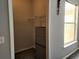 Walk-in closet features neutral colors, a window, and a dresser at 1325 Lake Shadow Cir # 12205, Maitland, FL 32751