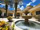 Apartment complex courtyard with lush landscaping and a water fountain feature at 1325 Lake Shadow Cir # 12205, Maitland, FL 32751