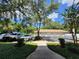 Detached garages with tile roof and landscaping in a well maintained community at 1325 Lake Shadow Cir # 12205, Maitland, FL 32751