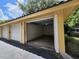 A clean and organized two-car garage with plenty of space for vehicles and storage at 1325 Lake Shadow Cir # 12205, Maitland, FL 32751
