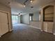 Spacious living room with carpet, ceiling fan, a balcony, and built in shelves at 1325 Lake Shadow Cir # 12205, Maitland, FL 32751
