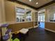 Community playroom with fun toys and a window view of the bright fitness center at 1325 Lake Shadow Cir # 12205, Maitland, FL 32751