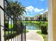 Apartment building overlooking a pond and manicured green space at 1325 Lake Shadow Cir # 12205, Maitland, FL 32751
