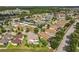 Aerial view of residential neighborhood showcasing various single-Gathering homes at 16072 Shasta St, Clermont, FL 34714