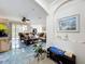 A spacious living room featuring elegant furnishings and unique blue marble-style flooring at 16072 Shasta St, Clermont, FL 34714