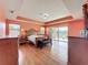 The main bedroom features a tray ceiling, access to a balcony, and two night stands and dressers for lots of storage at 16072 Shasta St, Clermont, FL 34714