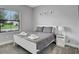 Comfortable bedroom features bright natural light and neutral decor at 163 Kenny Blvd, Haines City, FL 33844