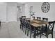 Bright dining room featuring a table with seating for ten and contemporary decor at 163 Kenny Blvd, Haines City, FL 33844