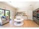 Bright market area featuring tiled floors, snack racks, drink coolers, and white tables at 1810 Caribbean View Ter, Kissimmee, FL 34747