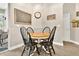 Cozy breakfast nook featuring a round table, four chairs, and a view of the outdoors perfect for casual meals at 1822 Ashton E Dr, St Cloud, FL 34771