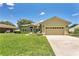 Charming single-Gathering home boasts a well-maintained lawn and a two-car garage, offering a welcoming curb appeal at 1822 Ashton E Dr, St Cloud, FL 34771