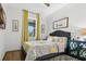 Warm and inviting bedroom with a comfortable bed, stylish decor, and plenty of natural light creating a cozy retreat at 1856 Castleton Dr, St Cloud, FL 34771