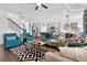 Spacious living room showcasing seamless flow to the kitchen and dining, perfect for entertaining at 1856 Castleton Dr, St Cloud, FL 34771