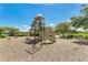 Community playground with slides and climbing structures, offering a fun and safe space for children to play at 1856 Castleton Dr, St Cloud, FL 34771