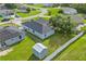 Aerial view showcasing the home's well-manicured lawn and fenced yard at 1913 Manatee Ct, Kissimmee, FL 34759