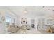 Bright living room with contemporary decor, plush seating, and large windows for ample natural light at 1913 Manatee Ct, Kissimmee, FL 34759