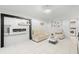 Bright living room featuring an electric fireplace and contemporary finishes at 1913 Manatee Ct, Kissimmee, FL 34759