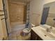 Bathroom features a shower-tub combination, tile surround and vanity with mirror at 1920 Conway Rd # 4, Orlando, FL 32812