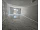 Bright living room with tile floors and sliding glass doors to the outdoor area at 1920 Conway Rd # 4, Orlando, FL 32812
