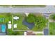 Overhead aerial of the property, highlighting the yard, RV parking, and shed at 2 S Lavon Ave, Kissimmee, FL 34741