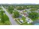 Birds eye view of a home with mature trees and RV parking in a quiet neighborhood at 2 S Lavon Ave, Kissimmee, FL 34741