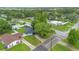 Aerial view of the home, RV parking, with a storage shed and fenced yard at 2 S Lavon Ave, Kissimmee, FL 34741