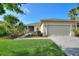 Beautiful single story home with well-maintained landscaping, paver driveway and walkway, plus a two-car garage at 214 Verona Dr, Kissimmee, FL 34759