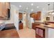 Gourmet kitchen featuring stainless steel appliances, ample cabinetry, and durable countertops at 214 Verona Dr, Kissimmee, FL 34759