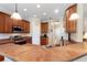 Gourmet kitchen featuring stainless steel appliances, ample cabinetry, and durable countertops at 214 Verona Dr, Kissimmee, FL 34759