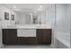 Bathroom featuring double sinks and a vanity with modern fixtures and clean lines at 2561 Montego Bay Blvd, Kissimmee, FL 34746