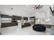 Modern kitchen featuring stainless steel appliances and a stylish center island at 2561 Montego Bay Blvd, Kissimmee, FL 34746