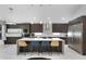 Modern kitchen featuring stainless steel appliances and a stylish center island at 2561 Montego Bay Blvd, Kissimmee, FL 34746