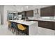 Modern kitchen featuring stainless steel appliances and a stylish center island at 2561 Montego Bay Blvd, Kissimmee, FL 34746