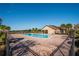 Large community pool with ample seating, ideal for enjoying a refreshing swim and soaking up the sun at 2703 Eagle Canyon S Dr, Kissimmee, FL 34746