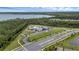 A bird's eye view features the community pool, clubhouse, and picturesque nature views at 2838 Common Crane Ct, Harmony, FL 34773