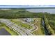 This aerial image shows the neighborhood community pool and lush nature views at 2838 Common Crane Ct, Harmony, FL 34773