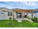 Beautiful backyard with a covered lanai area perfect for relaxing and outdoor gatherings at 2838 Common Crane Ct, Harmony, FL 34773