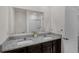 Bathroom featuring a double vanity, granite countertop, and tiled shower and tub combo at 2838 Common Crane Ct, Harmony, FL 34773