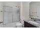 Bathroom with granite countertops, stainless steel faucet and shower and tub combination at 2838 Common Crane Ct, Harmony, FL 34773